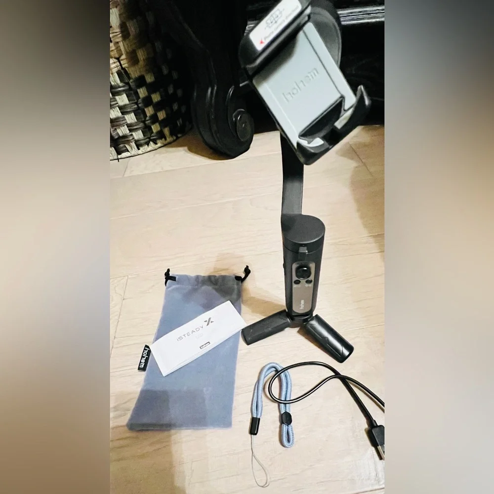 Hohem iSTEADY Gimbal v1.0 (Phone Tri-pod). Used a few times. LIKE Brand NEW